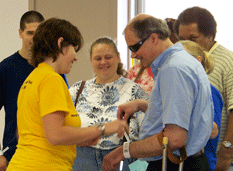 residents putting on bracelets